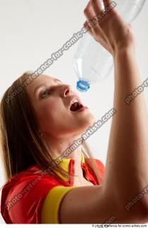 MARTINA BAYWATCH STANDING POSE WITH BOTTLE